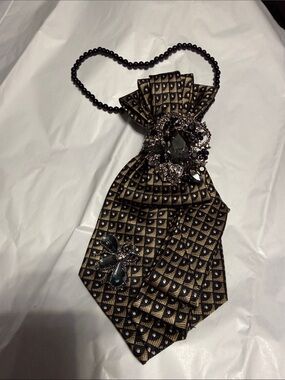 Jeweled Black and Gold Necklace with Black and Silver Accents.
